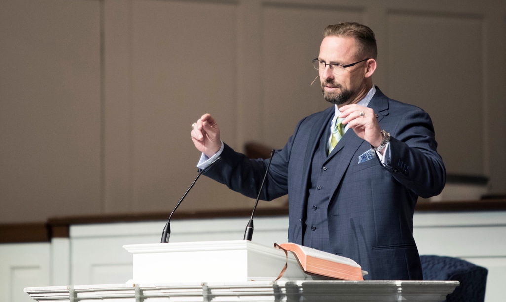 Clint Pressley preaching during a Sunday service at Hickory Grove Baptist Church