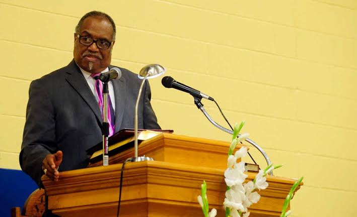 Southern Baptist pastor preaching during a Sunday worship service