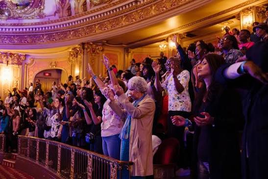 Worshippers gathered inside the main sanctuary of Times Square Church