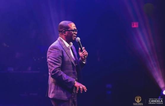 O'Neil Watson singing on stage
