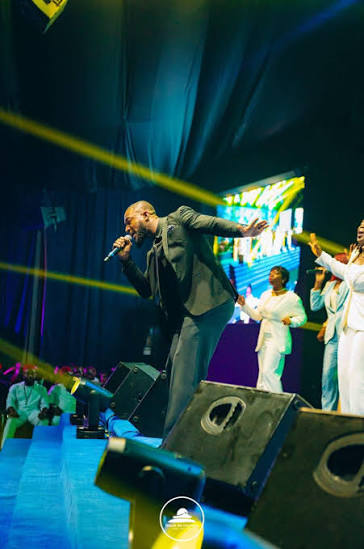 Joe Mettle performing on stage