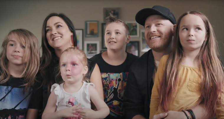 Jordan St. Cyr with his wife Heather and their four children