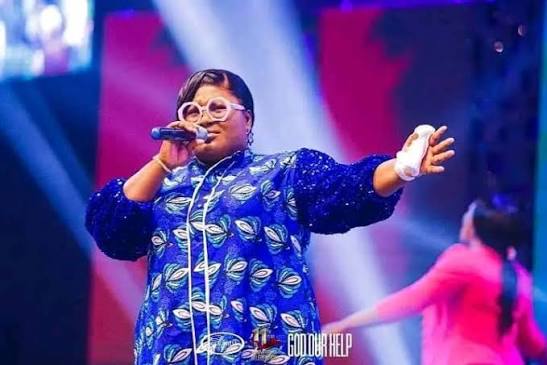 Judikay performing on stage